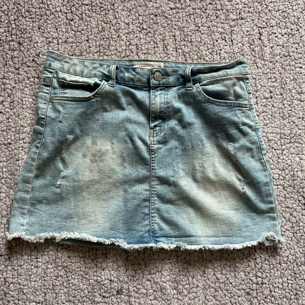 Distressed 5 Pocket Denim Jean skirt with freyed hem